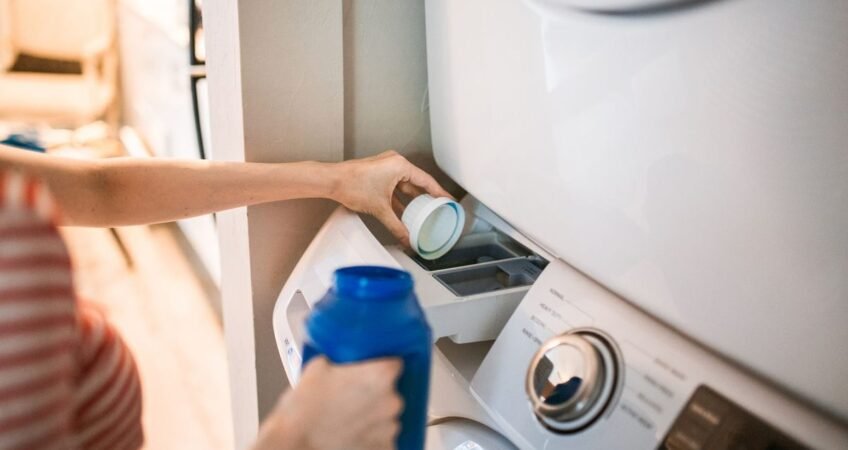A washer that walks: level, leftover bolts, then suspension